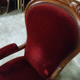 Walnut and velvet armchair
