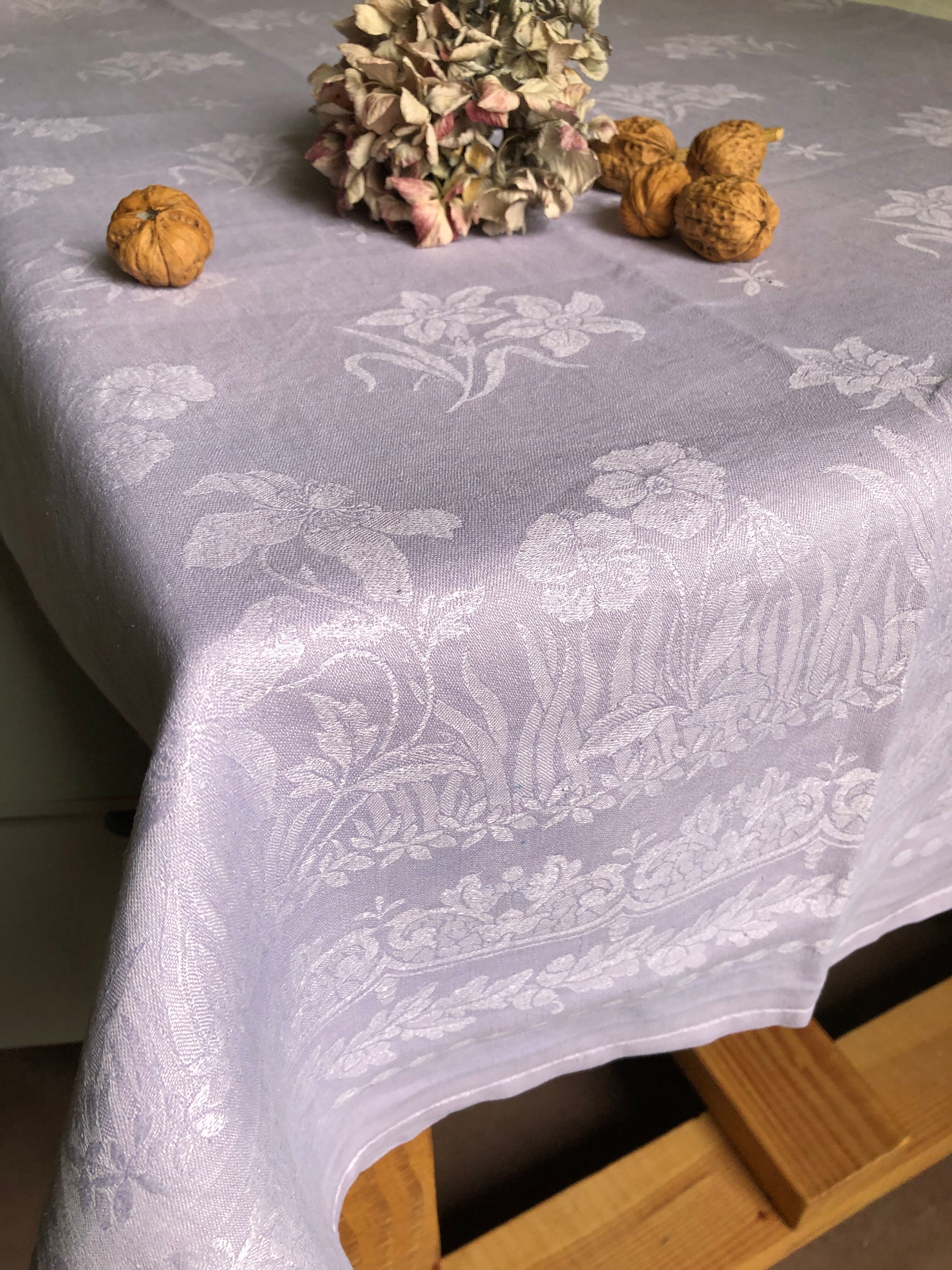 Old linen tablecloth and lilac-tinted silk