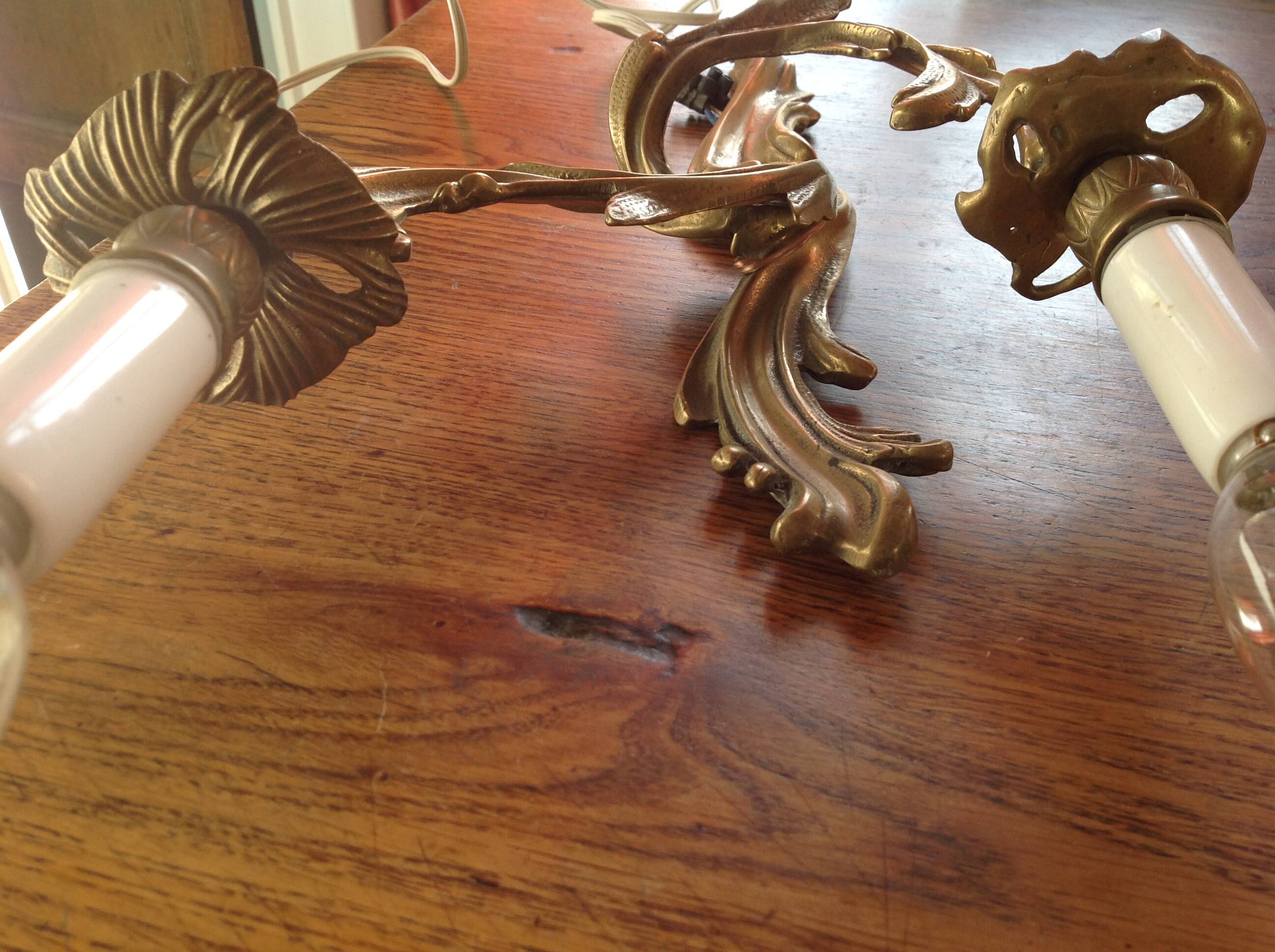 Pair of antique bronze wall lights, early 20th century
