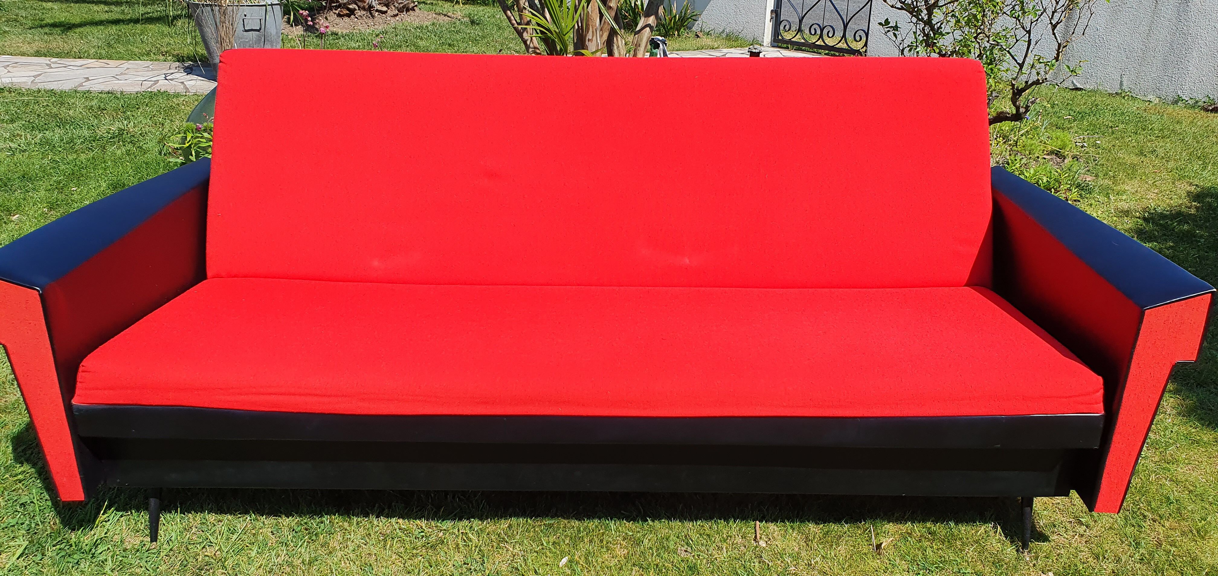 Vintage sofa 3 places convertible, red fabric and black skaï.1960s.