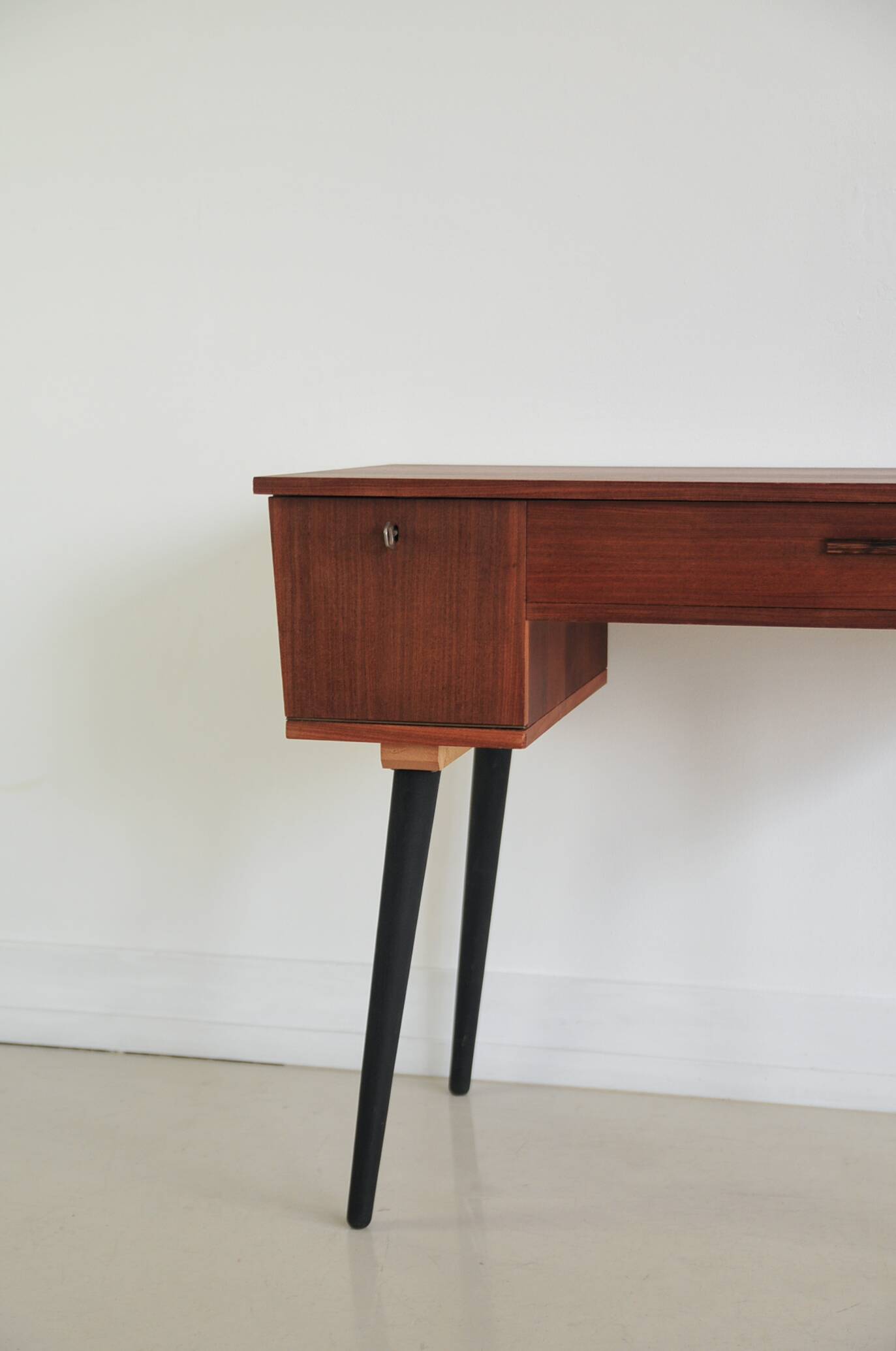 Vintage teak desk on black legs