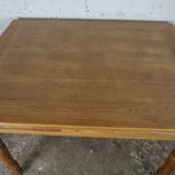 solid oak table with extensions and molded legs