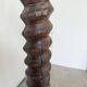 Pair of pedestal columns with oak pressing screws, 1900