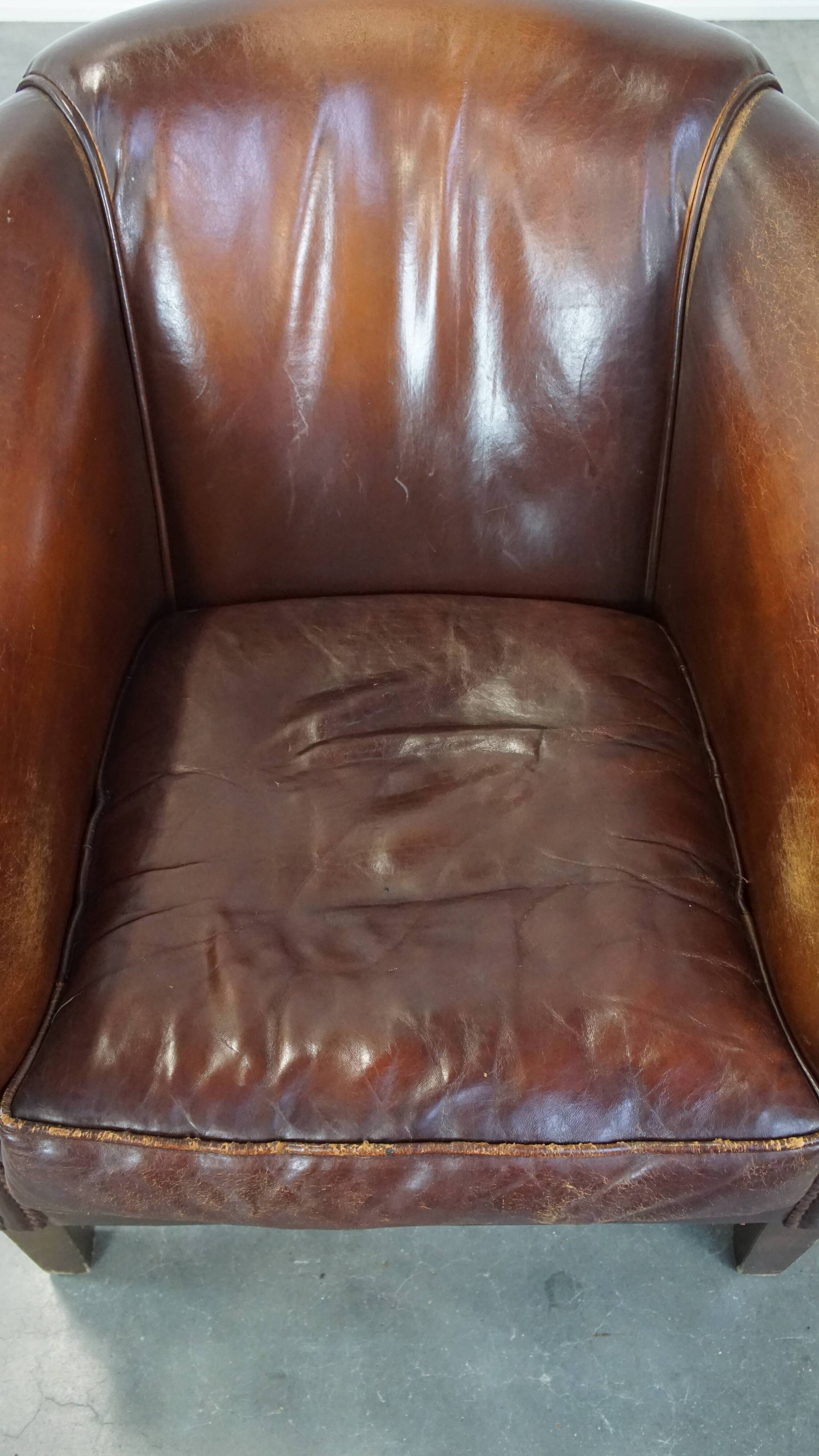 Vintage club armchair made of sheep leather