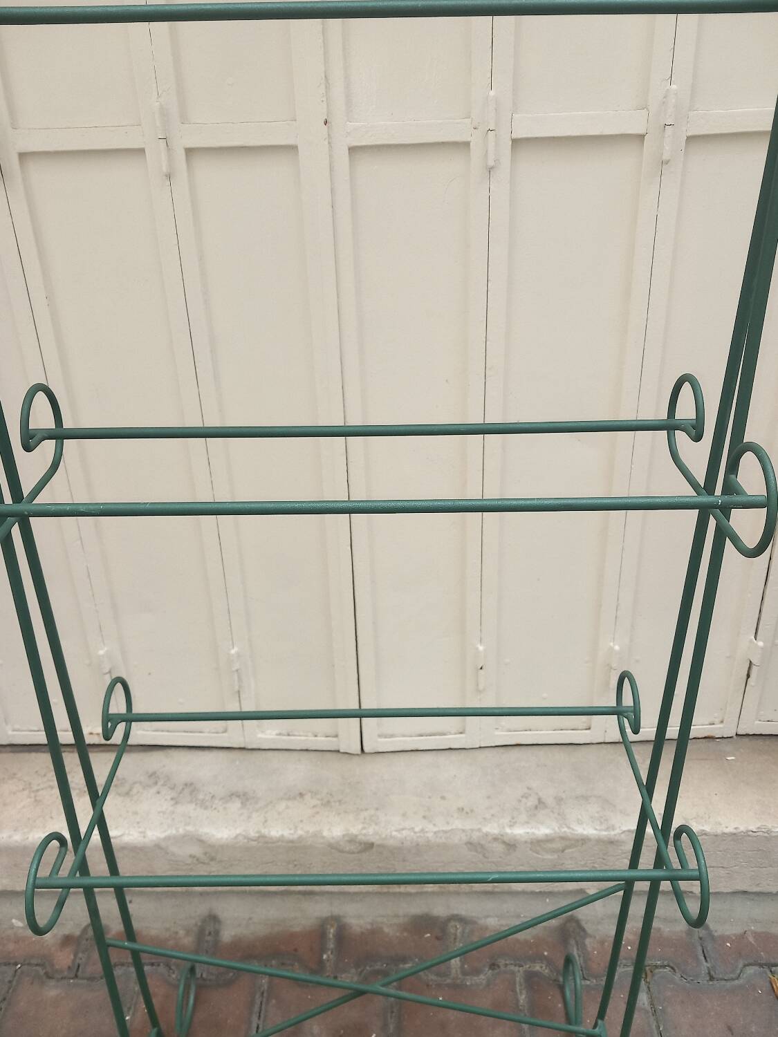 Wrought iron towel rack