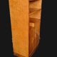 Art Deco cabinet in speckled maple veneer with asymmetrical shelves.