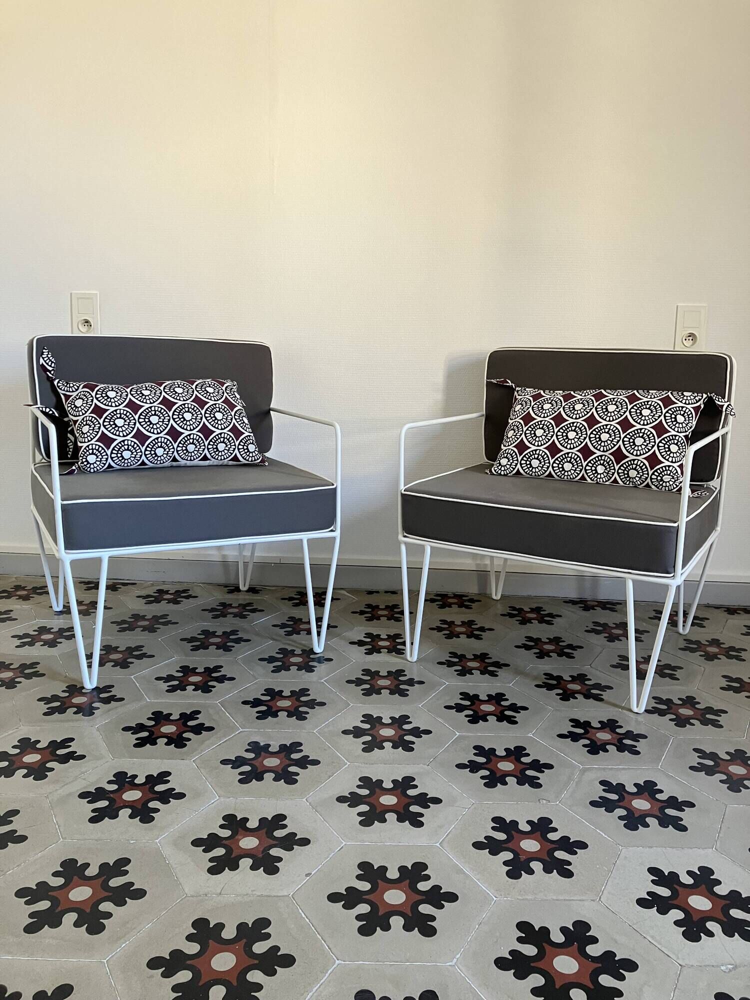 Vintage white metal Croisette style armchairs with hairpin legs in superb condition