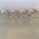 Four old molded glass shells