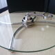 Cheese platter made of glass and silver metal and its serving cutlery