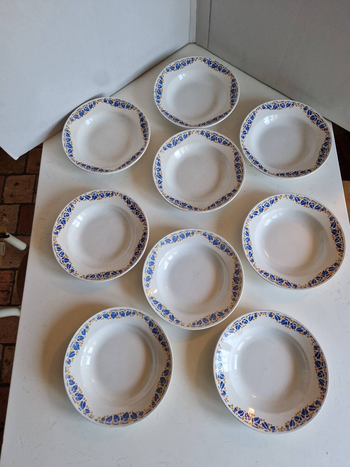 Set of 9 deep plates, earthenware from Creil Montereau, Colette model.