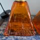 Set of two amber glass hanging lamps