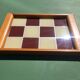 Plateau années 50 en bois et verre laqué, motif damier