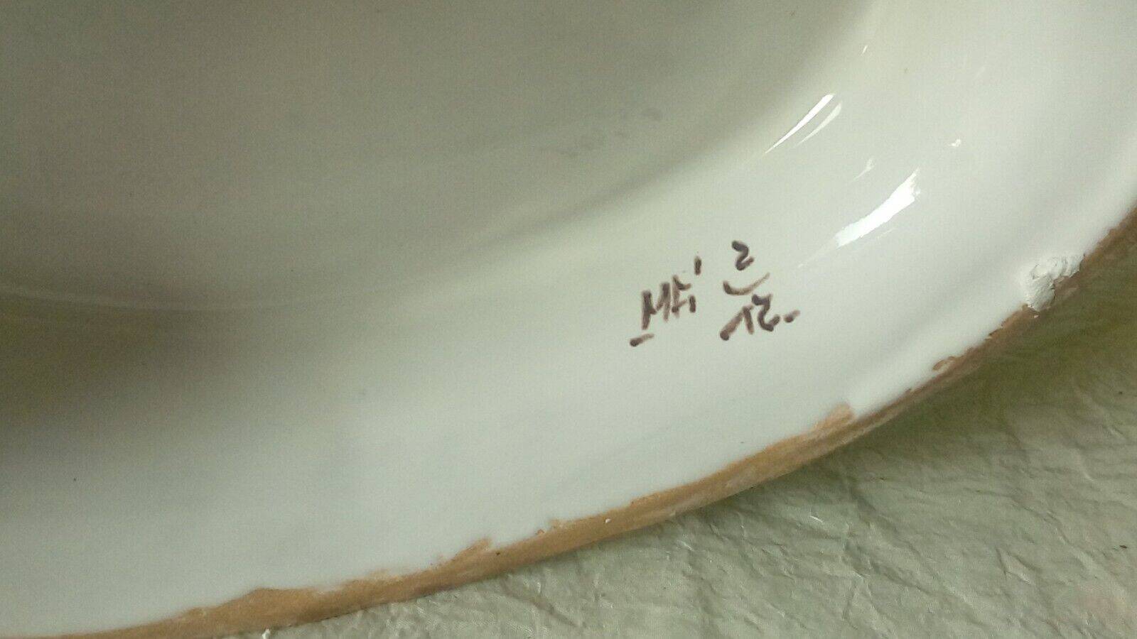 Moustiers earthenware planter with ram's head