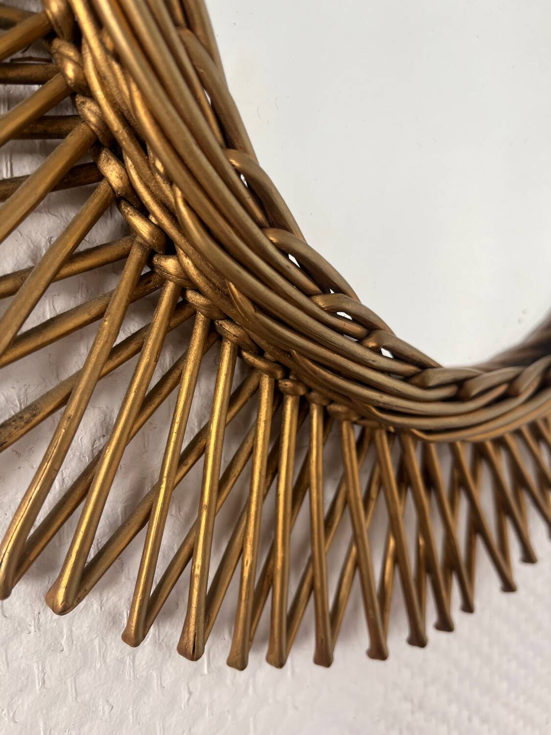 Vintage gold rattan sun mirror