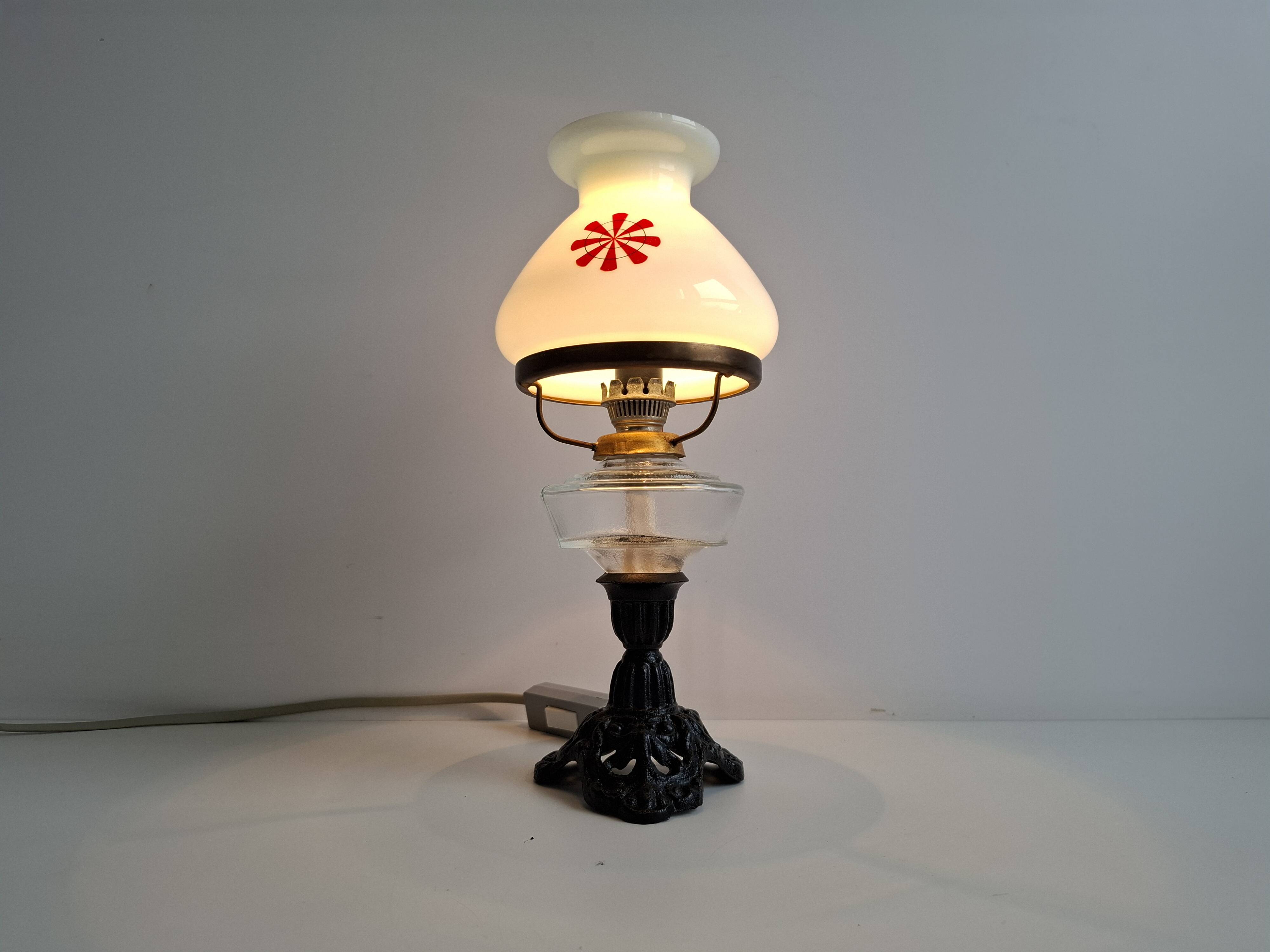 1960s Czechoslovakian milk glass oil lamp style table lamp with red windmill