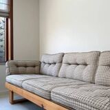 Two vintage Swedish sofas and a pine table