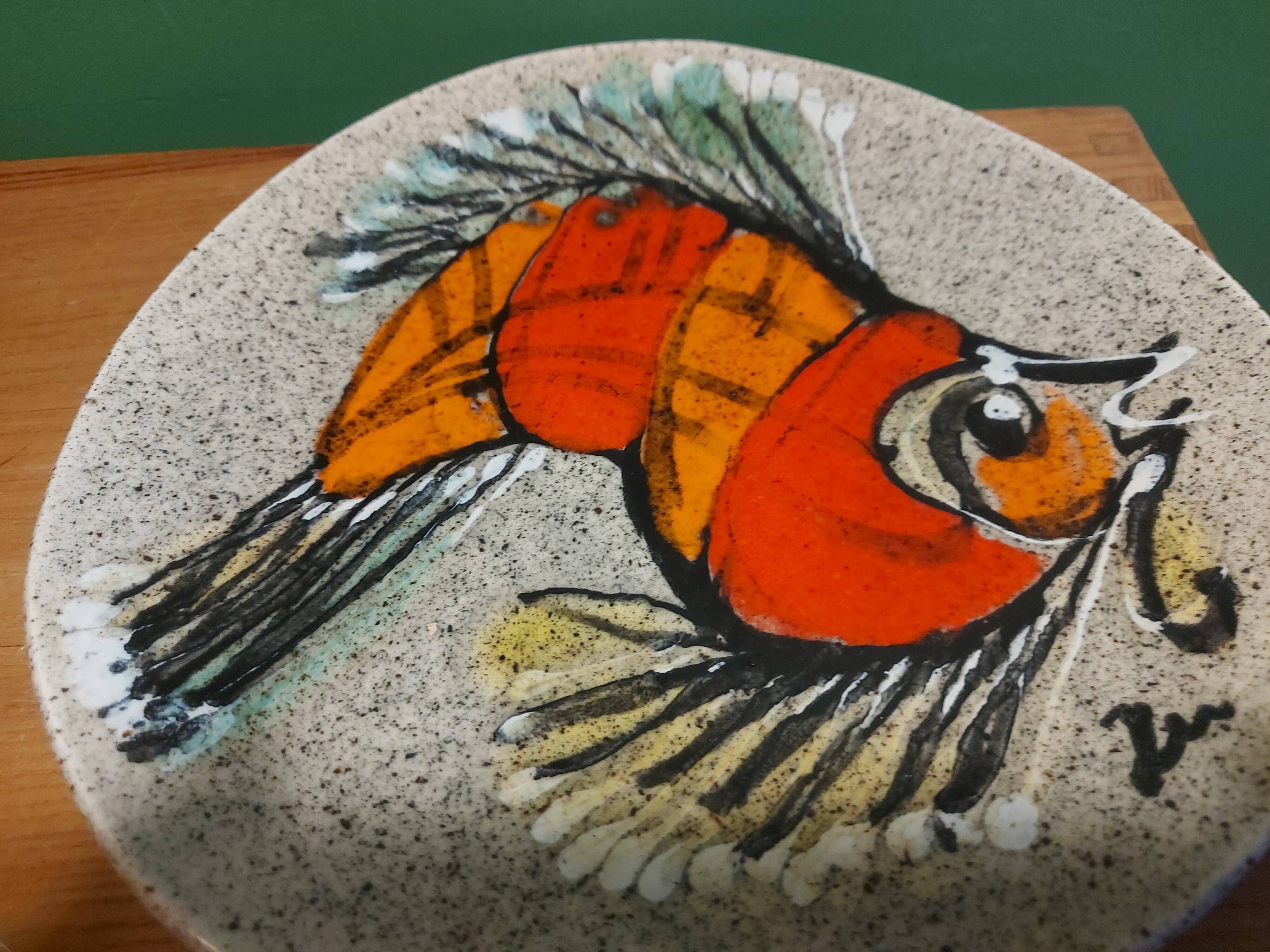 2 vintage ceramic plates with fish decoration