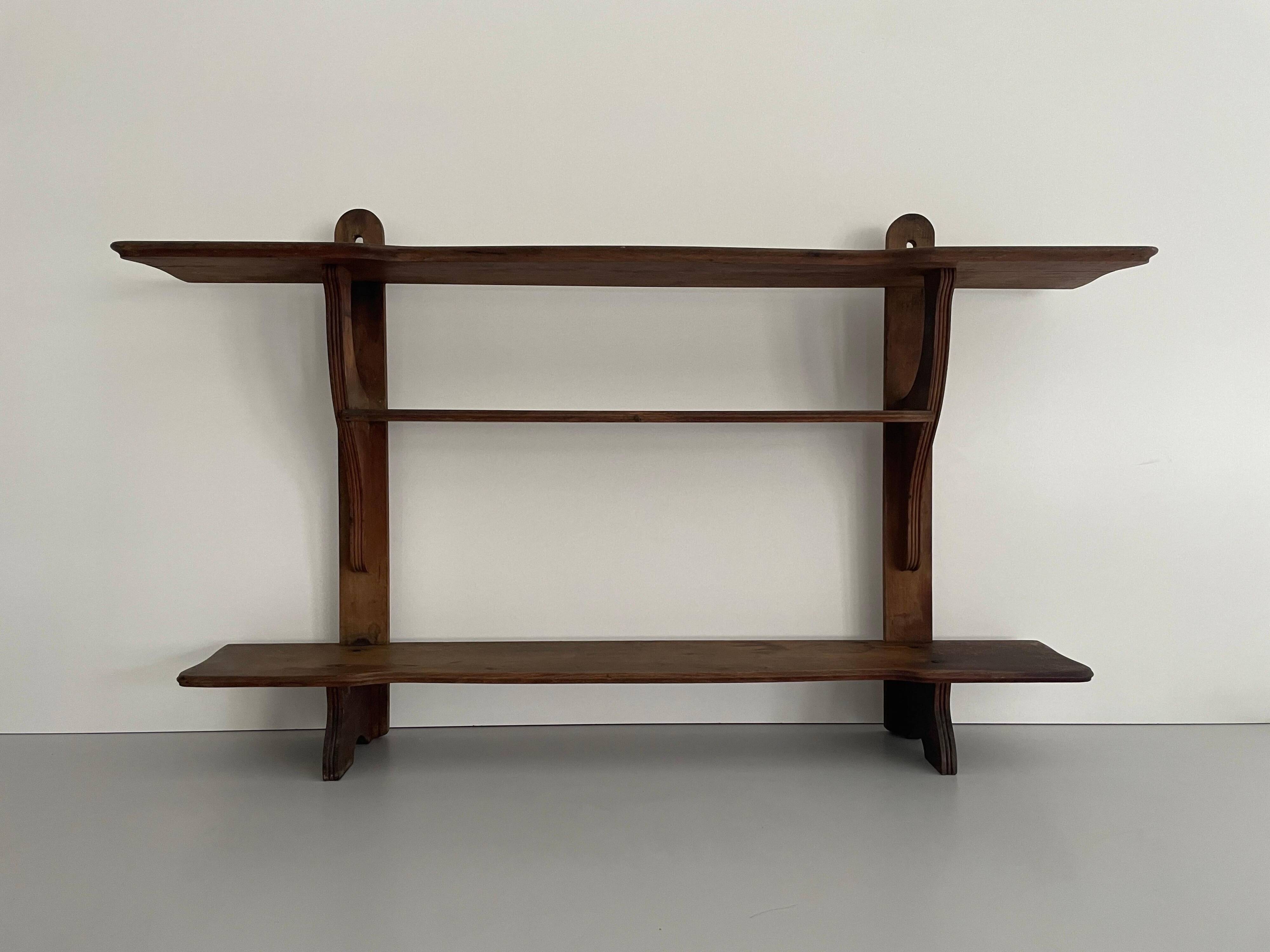 Art Deco wall shelf in wood with three levels, 1940s, Italy.