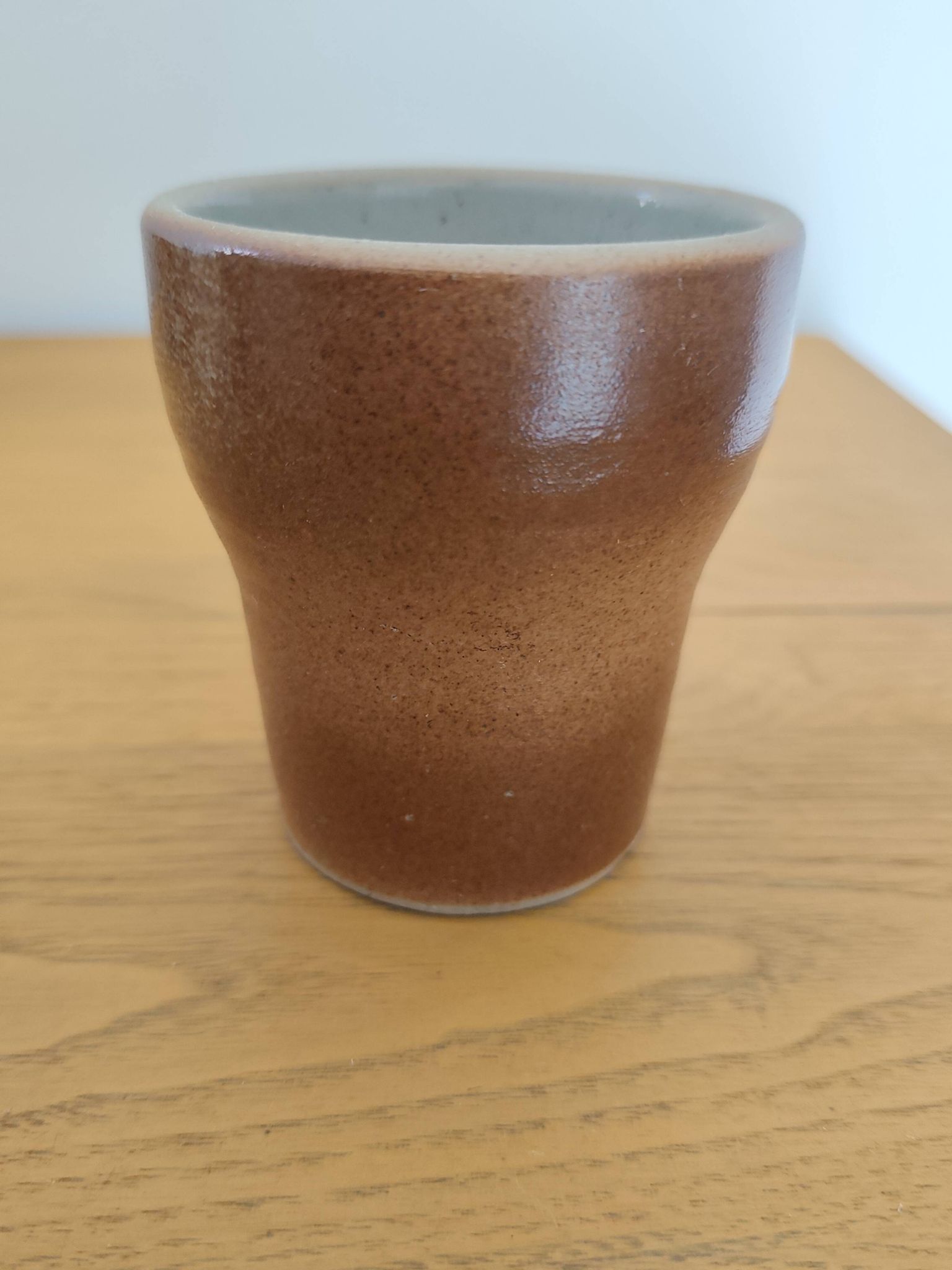 Stoneware cups – Armor stoneware set of 10 and an 11th French stoneware cup.