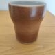 Stoneware cups – Armor stoneware set of 10 and an 11th French stoneware cup.