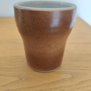Stoneware cups – Armor stoneware set of 10 and an 11th French stoneware cup.