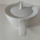 Graphic teapot in white porcelain with a minimalist design.