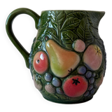 Carafe of water in slush with fruits