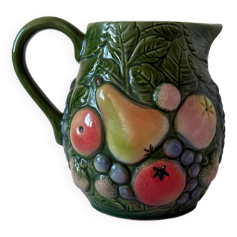Carafe of water in slush with fruits