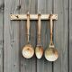Brass holder with 3 brass & wood utensils