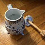 Antique chocolate pot in faience with its original whisk.
