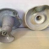 Pair of signed ceramic candlesticks