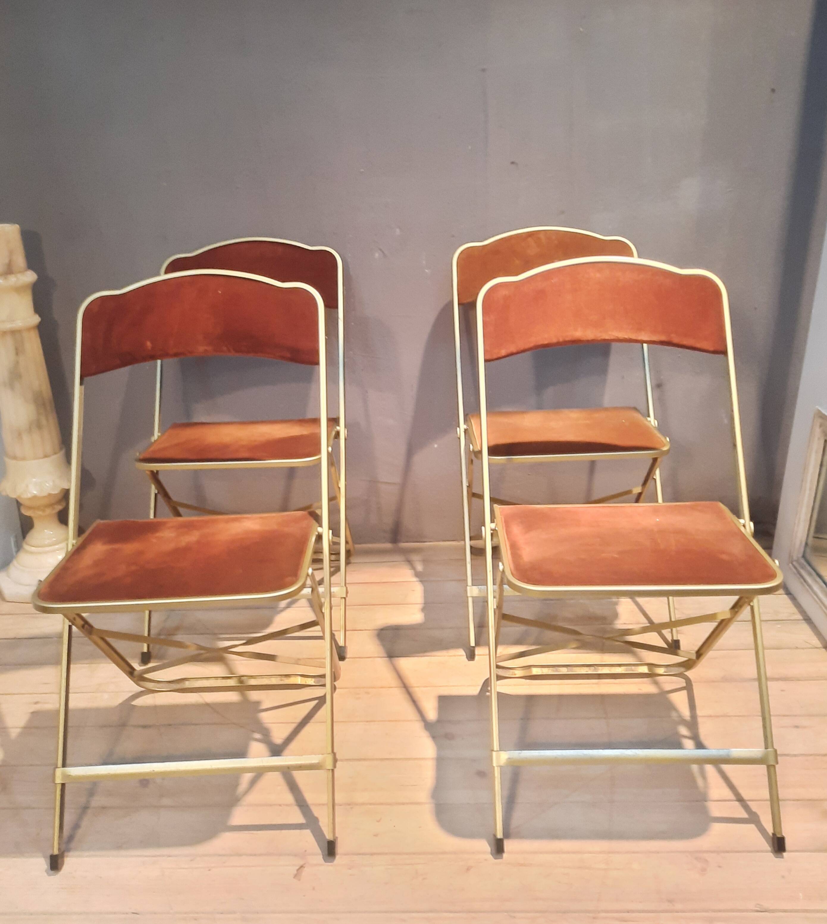 Set of four folding metal and velvet chairs