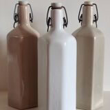 Trio of large hexagonal stoneware hot water bottles