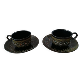 Tasses et soucoupes noir décor en relief