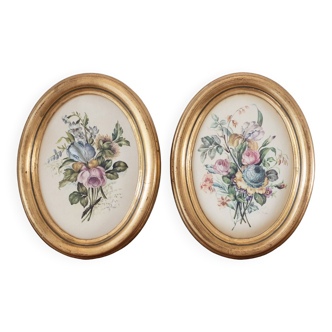 Pair of golden frames with vintage floral motifs