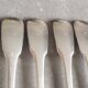 Set of 12 dessert forks and a cake server.
