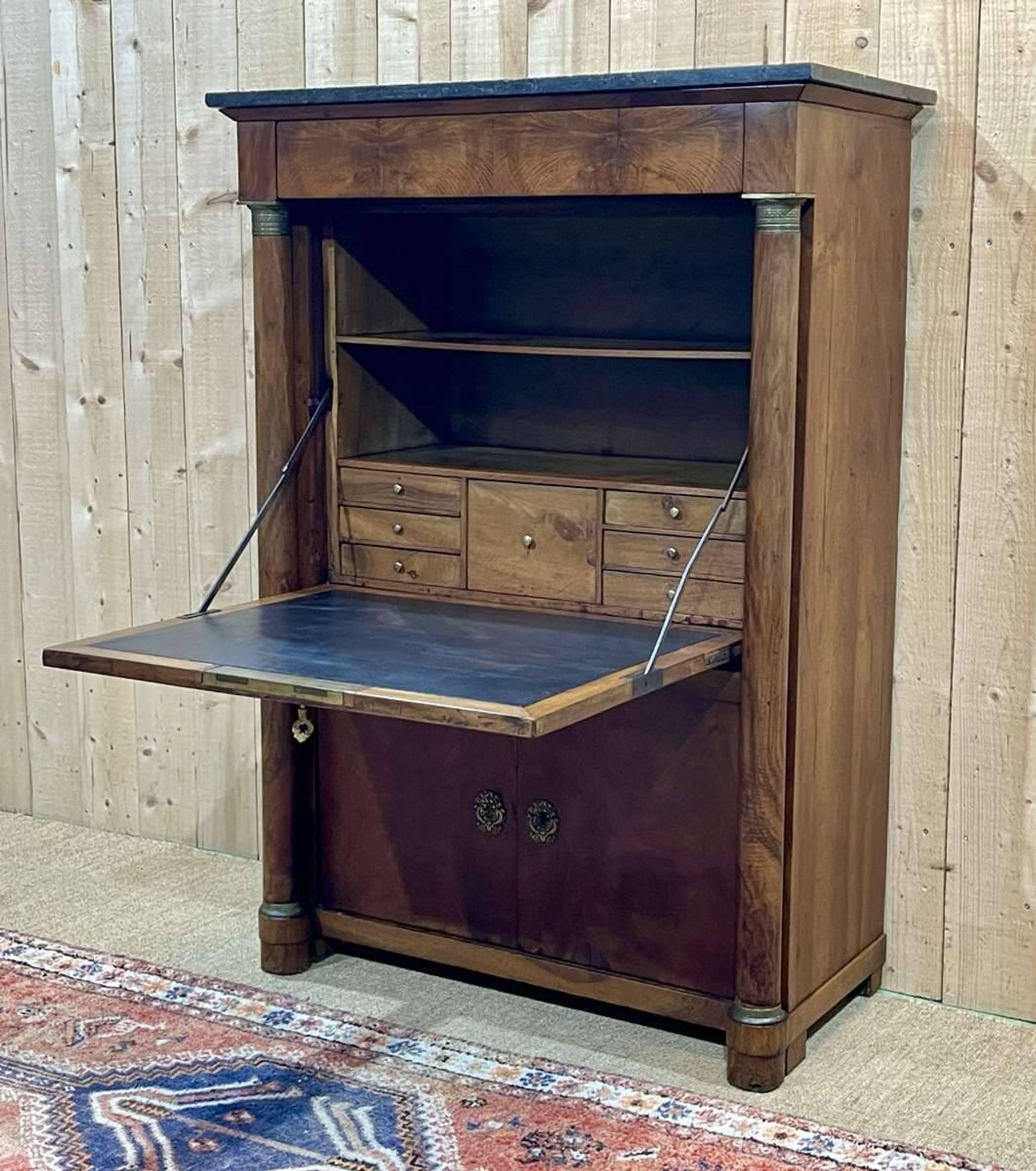 Empire period secretary in walnut, oak and black marble top