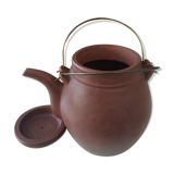 Chinese terracotta teapot with its basket
