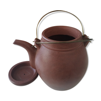 Chinese terracotta teapot with its basket