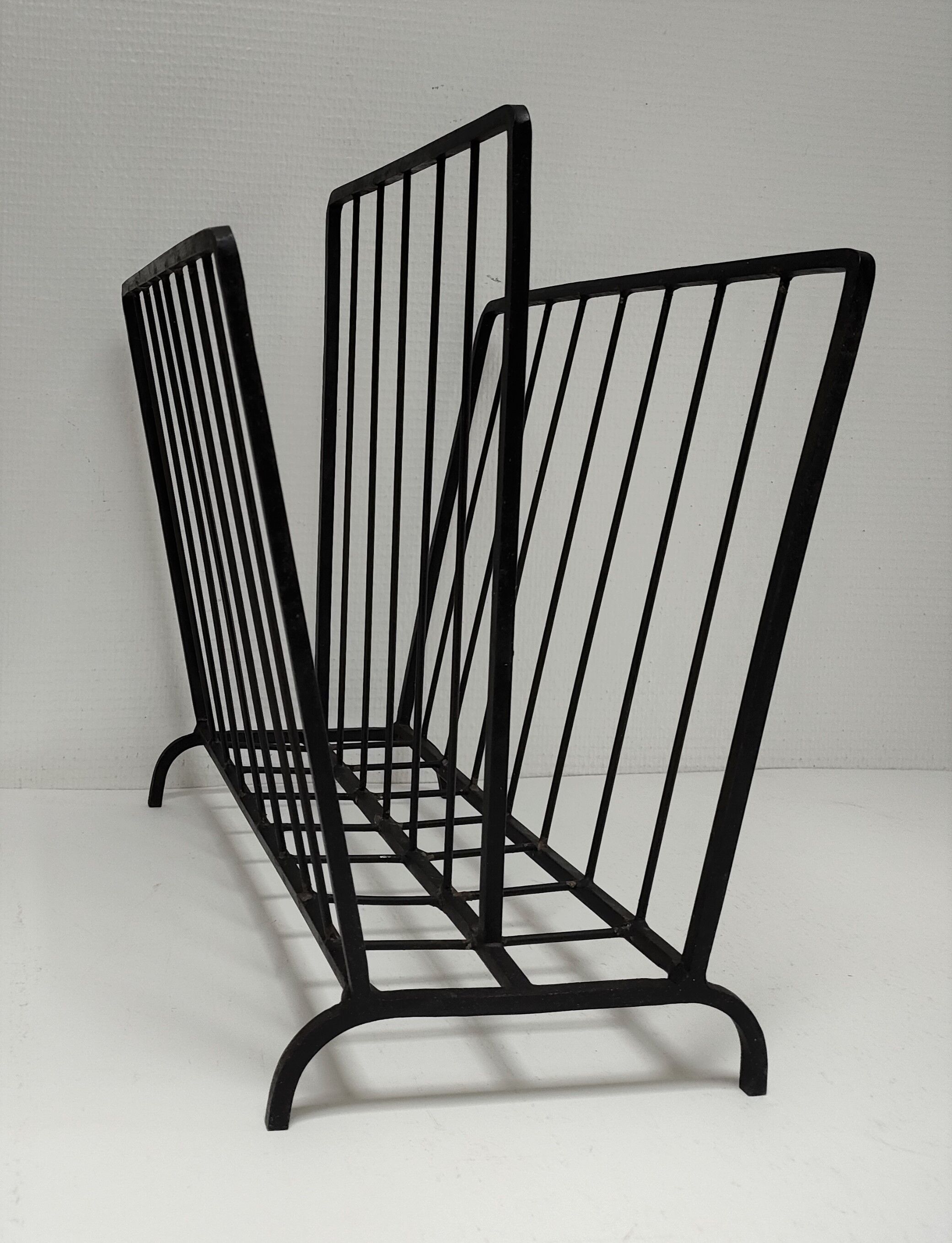 Modernist magazine holder black iron 60s