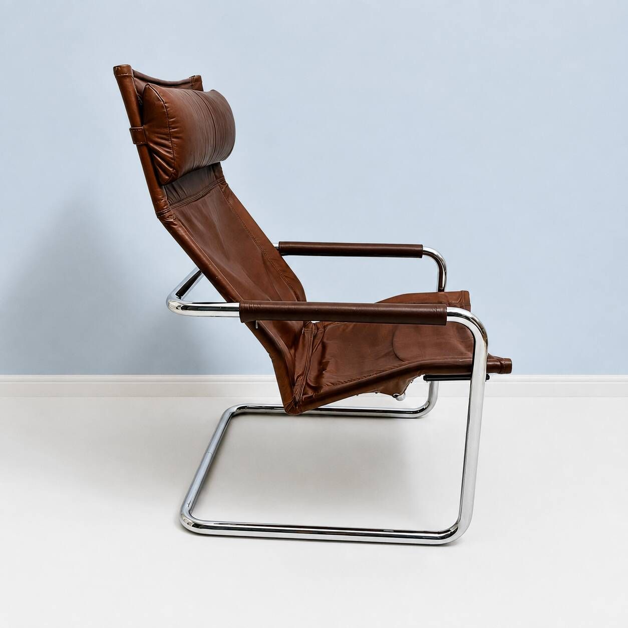 Fauteuil lounge en cuir havane et chrome – Heinrich Pfalzberger, années 197