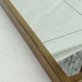 Mirror in a brass frame, dating back to the 1960s