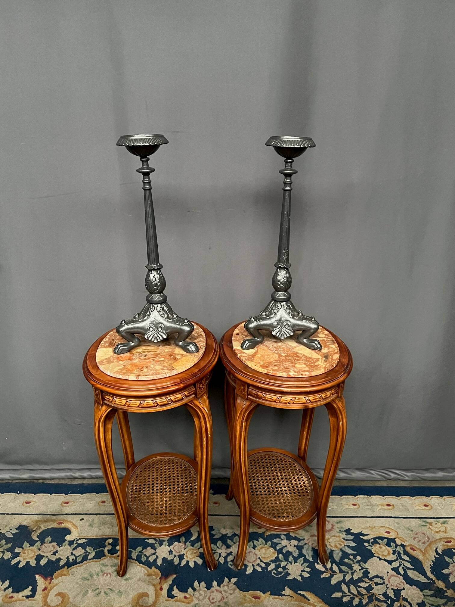 Pair of massive cast iron candlesticks in Renaissance style.
