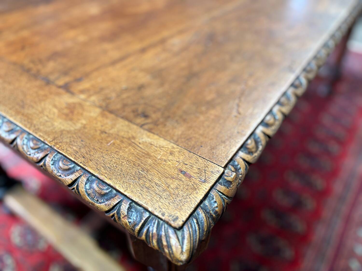 Large antique carved wooden desk in Renaissance style