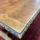 Large antique carved wooden desk in Renaissance style