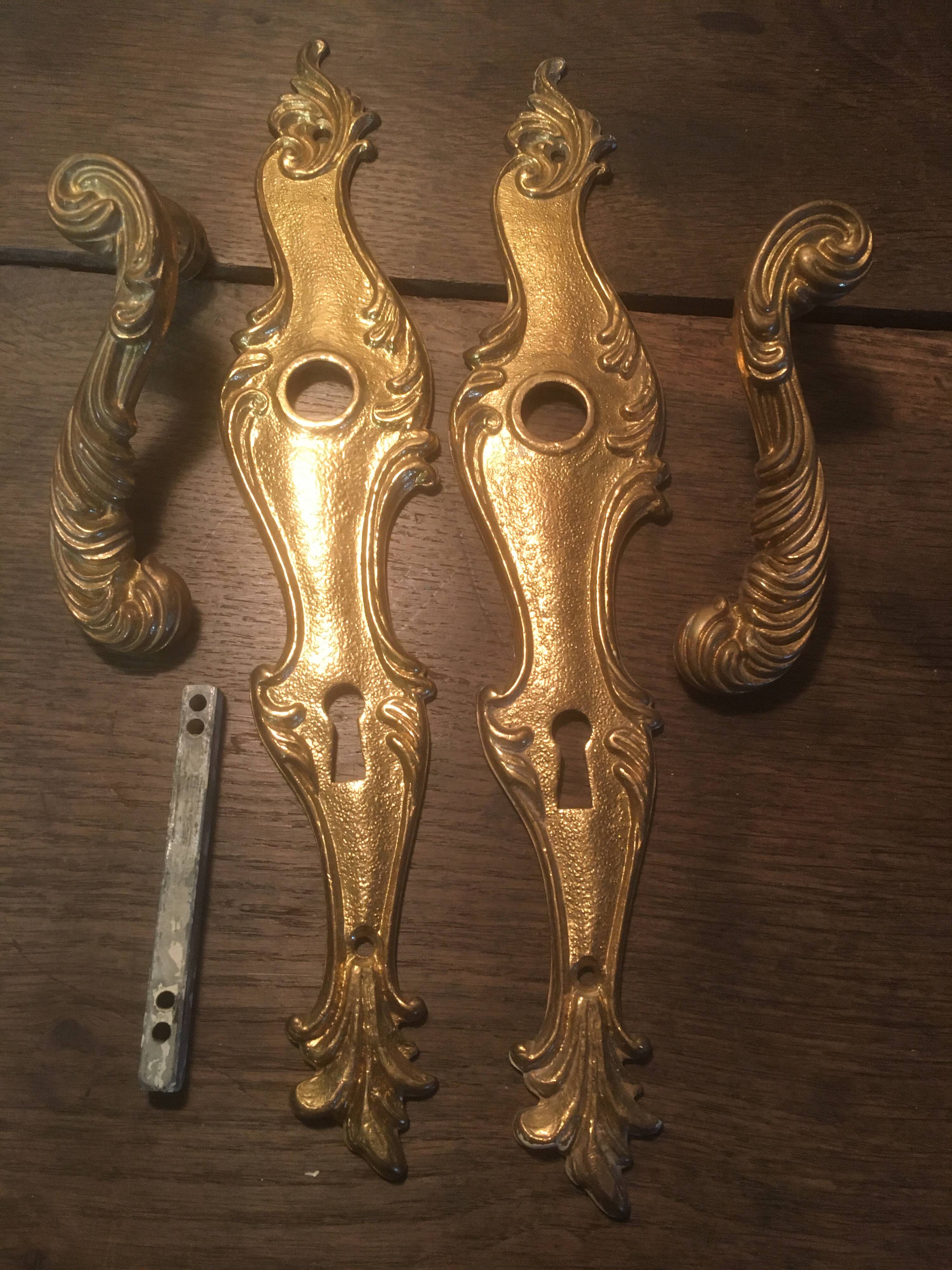 Louis xv style brass crutches and plaques