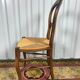 Suite de 6 chaises Louis Philippe paillées en noyer