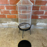 Antique black & white metal bird cage on vintage decorative legs