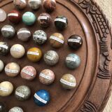 Solitaire game with semi-precious stones