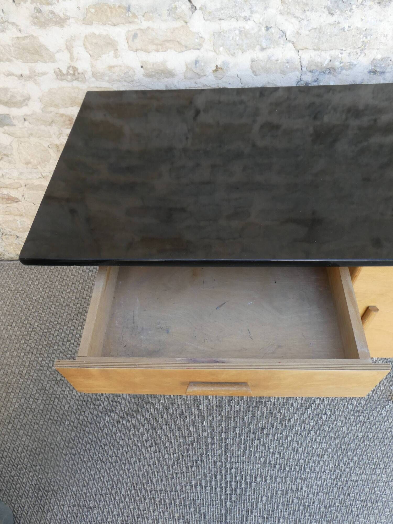 Baumann desk in light wood and black Formica, around 1960.